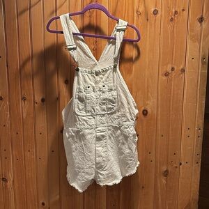 THE GREAT. Cream Denim Short Overalls Romper